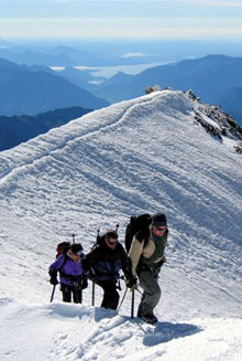 Steve guiding on the summit ridge of the Weissmeiss